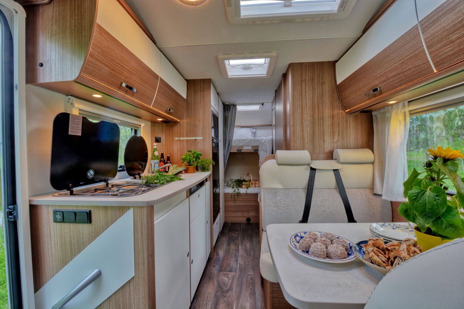 SkandiTrip family motorhome comfortable living room section and alcove beds