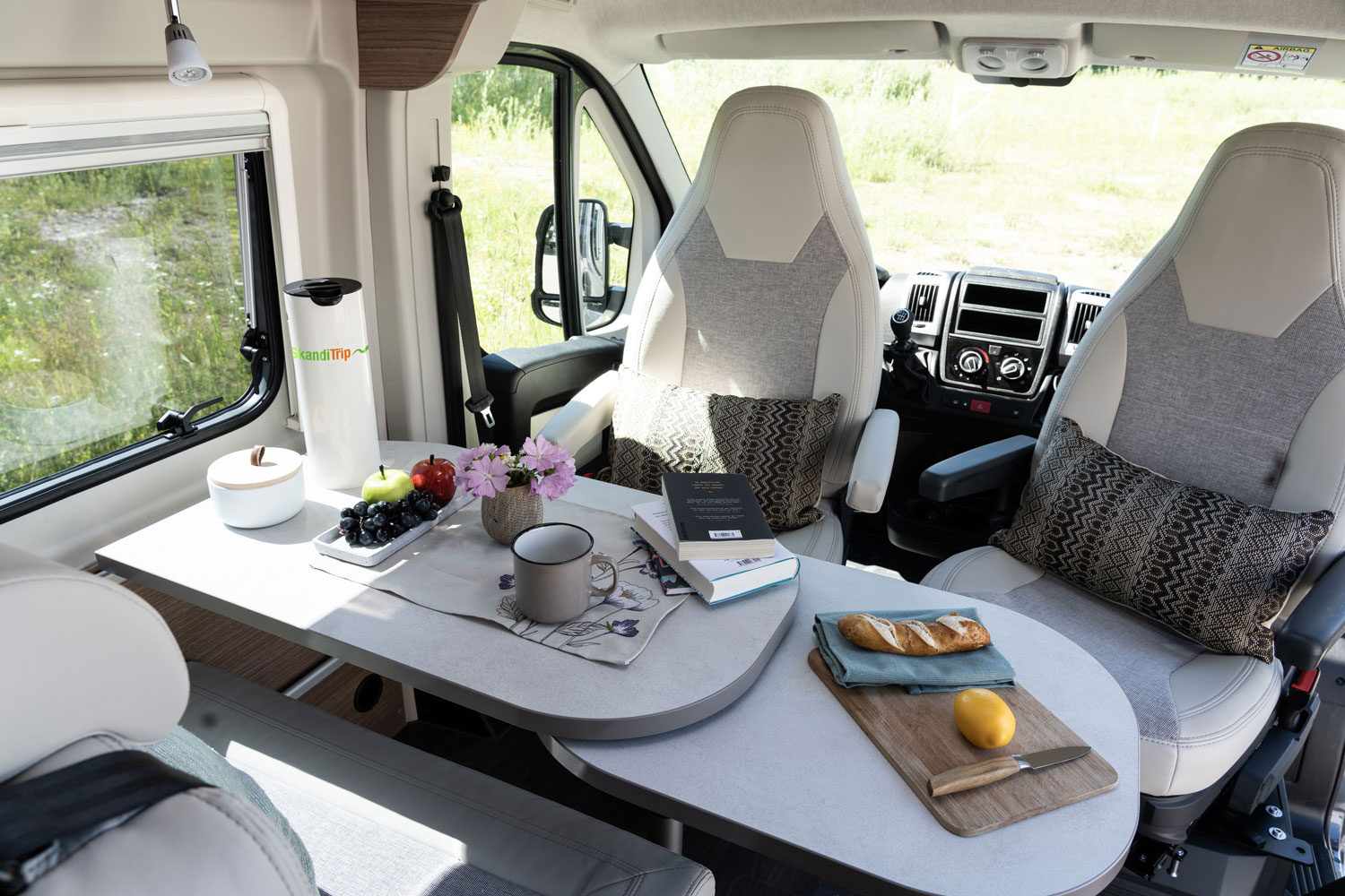 SkandiTrip petit camping car entrance and living room seats